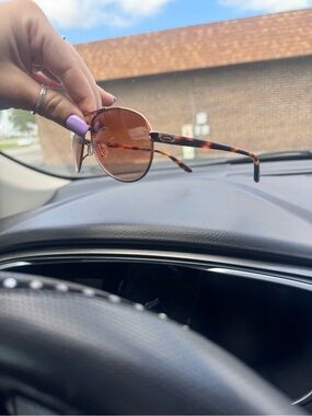 Oakley Tortoiseshell Frame Sunglasses with Brown Lenses